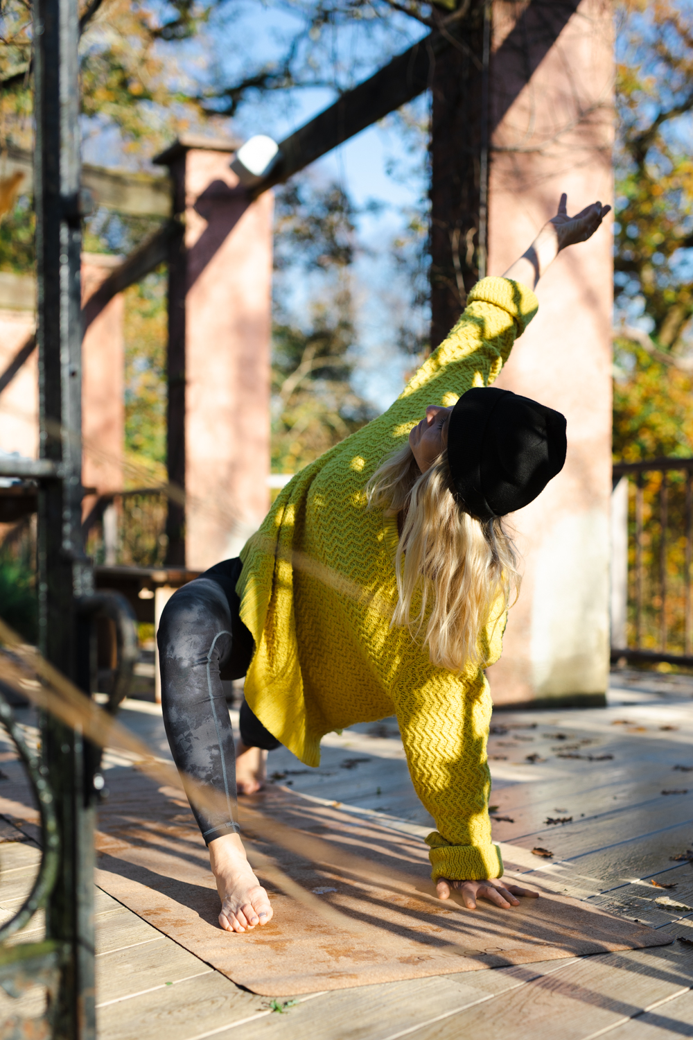 Gina yoga pose on deck