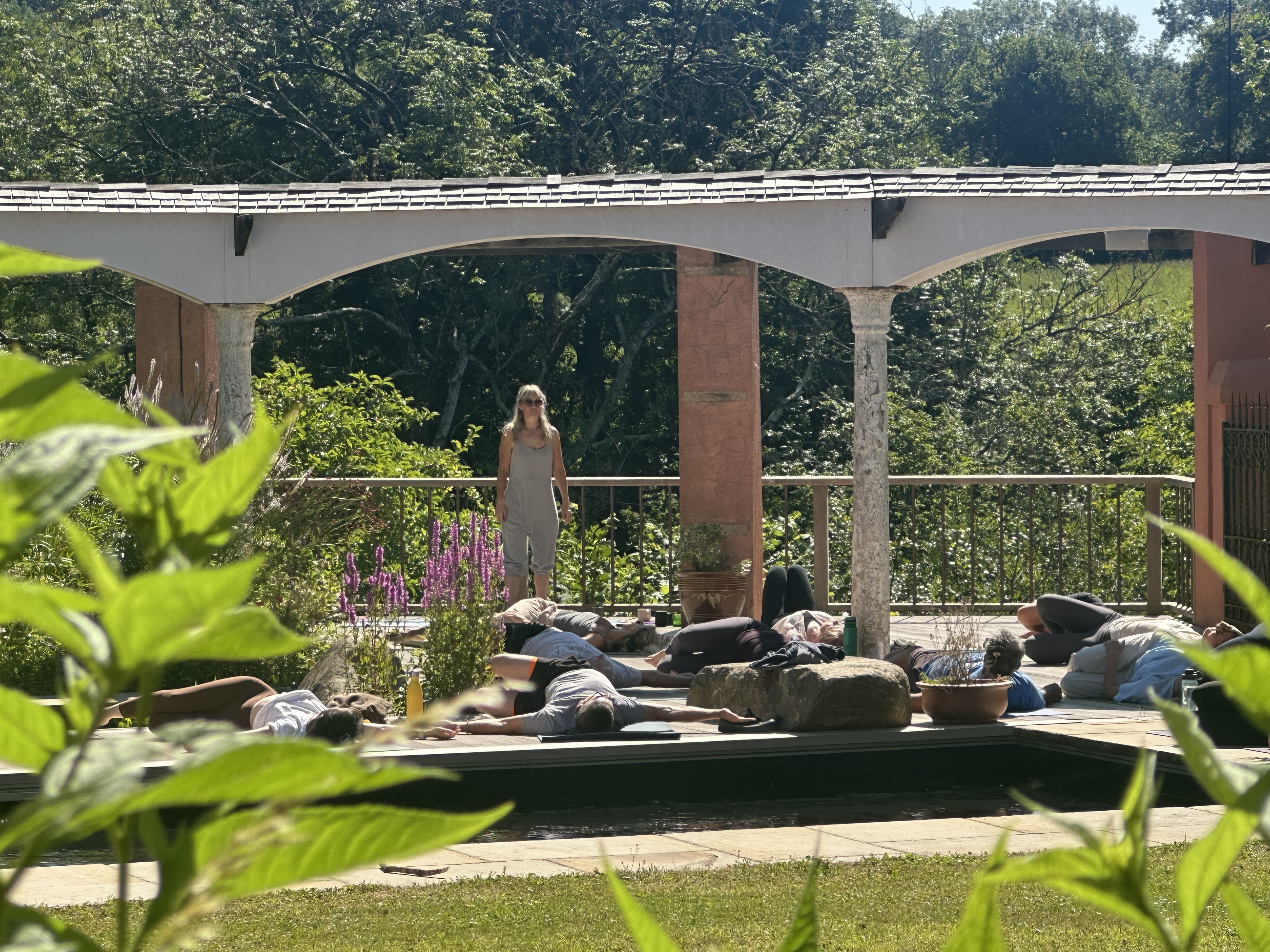 Yoga class by the pool