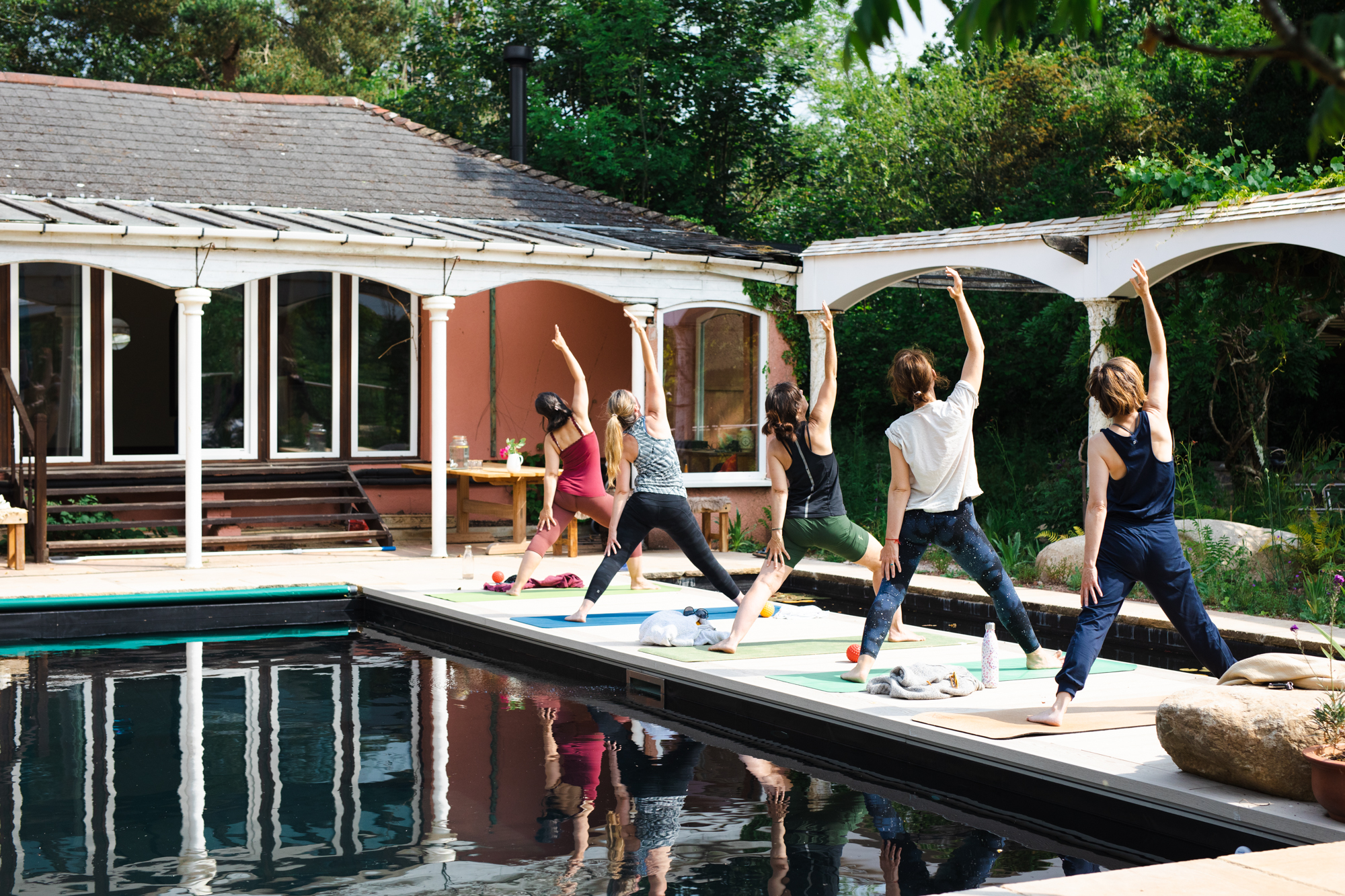 Yoga by the swim pond